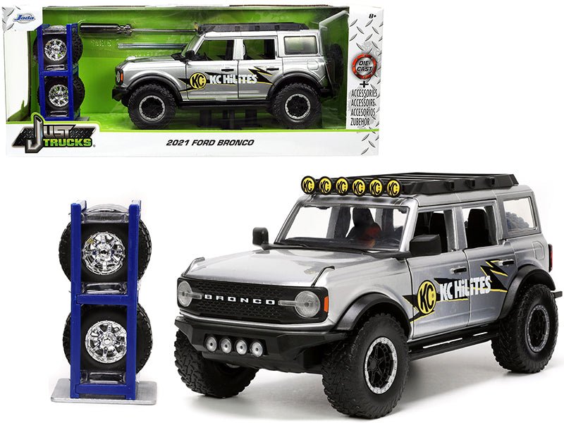 2021 Ford Bronco Gray Metallic "KC HiLiTES" with Extra Wheels "Just Trucks" Series 1/24 Diecast Model Car by Jada free shipping USA