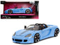 Porsche Carrera GT Convertible Blue with Black Stripes "Pink Slips" Series 1/24 Diecast Model Car by Jada  free shipping USA